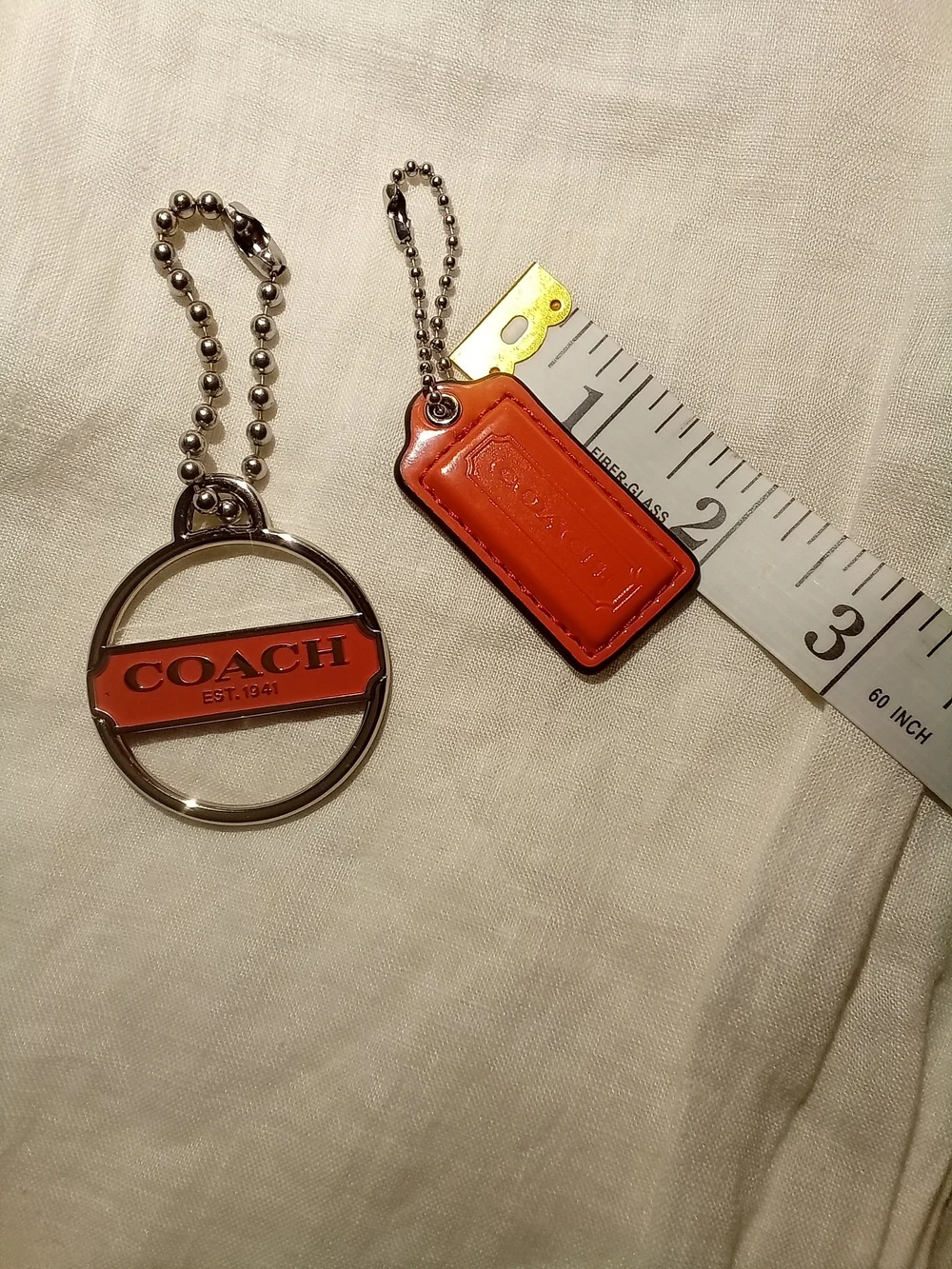 Coach Orange Leather & Silver-Tone Logo Keychain Set